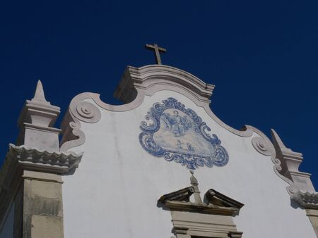 white tiled church in portugalの写真素材