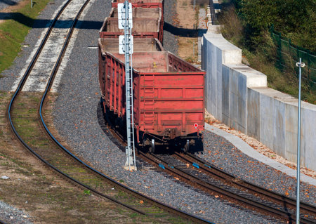 End of the train with empty wagons at the train station