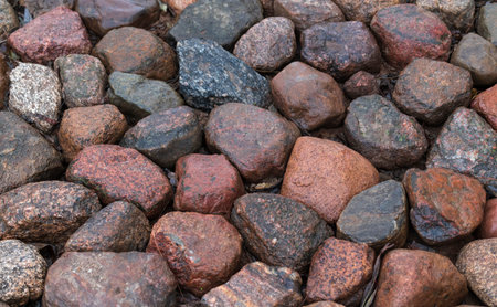 View from above of big stones on walking path.