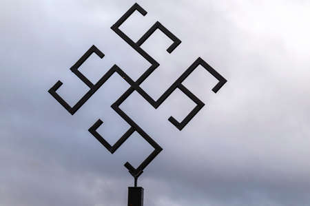 Photo of thunder cross silhouette against dramatic sky.の写真素材
