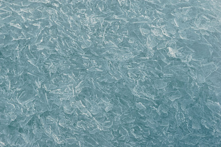 Abstract winter theme background of ice cracks pattern texture.の写真素材