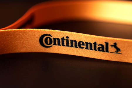 Neck lanyards strap string of continental company on black background.