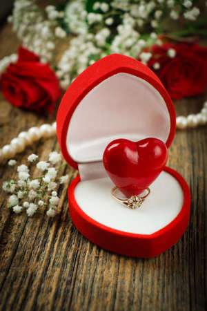 Proposal ring with roses and pearls.の写真素材