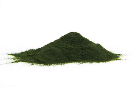 Heap of spirulina powder on bright backgroundの写真素材