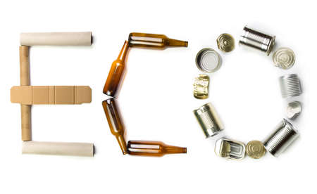 Ecology concept: ECO word made from paper, glass and metalの写真素材