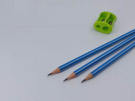 Close-up of blue pencils against white backgroundの写真素材