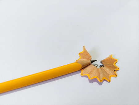 various colors of pencils on a white background, copy space