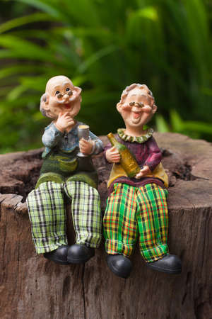 cute grandfather and grandmother ceramic dollsの写真素材