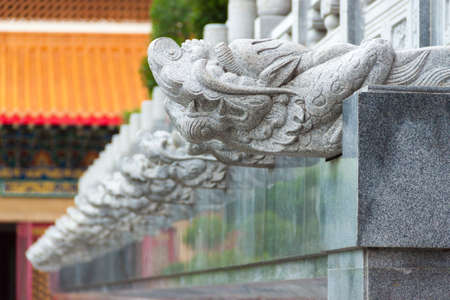 Head of chinese dragon statue in chinese temple Thailandの写真素材
