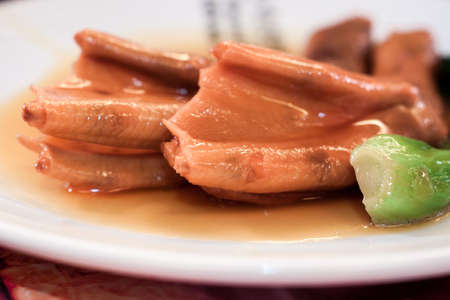 Roasted goose legs in red sauce chinese foodの写真素材