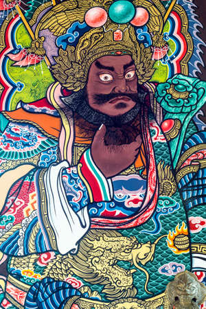 Zhang Fei deva paint fine art on the door of chinese temple in Thailandのeditorial素材