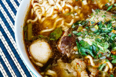 Thai pork noodle with soup called Boat Noodle or Kuayteow Ruaの写真素材