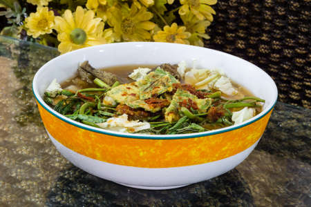 Thai Famous Food, Kaeng Som or Thai sour soup made of tamarind pasteの写真素材
