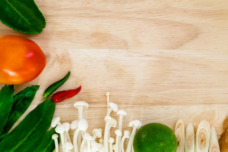Ingredient of Tom Yum spicy soup Traditional Thai food cuisine on wood backgroundの写真素材