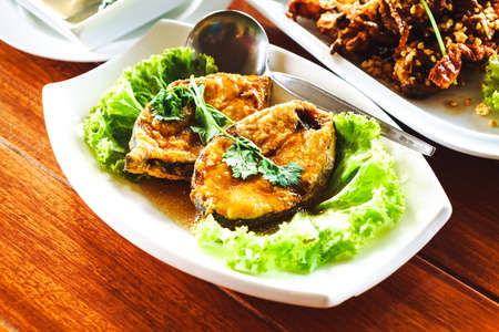 Thai Food - deep fried mackerel fish with soy sauceの写真素材