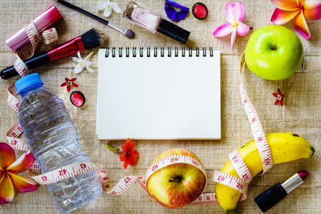 Healthy eating with women's cosmetic accessories concept with copy spaceの写真素材