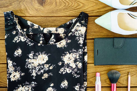 Women's clothes, shoes and cosmetics accessories close up top viewの写真素材