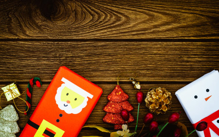 Greeting, Christmas decoration with DIY santa and snowman boxes on wooden Background with copy spaceの写真素材