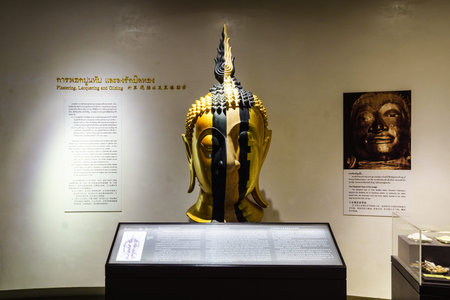 BANGKOK, THAILAND - DEC 18 : The Golden Buddha, Phra Buddha Maha Suwanna Patimakorn exhibition show the miracle of the world's biggest golden buddha: the construction, concealment and emergence  on December 18, 2016 at Wat Traimit Temple, Bangkok, Thailanのeditorial素材