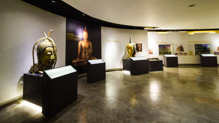 BANGKOK, THAILAND - DEC 18 : The Golden Buddha, Phra Buddha Maha Suwanna Patimakorn exhibition show the miracle of the world's biggest golden buddha: the construction, concealment and emergence  on December 18, 2016 at Wat Traimit Temple, Bangkok, Thailanのeditorial素材