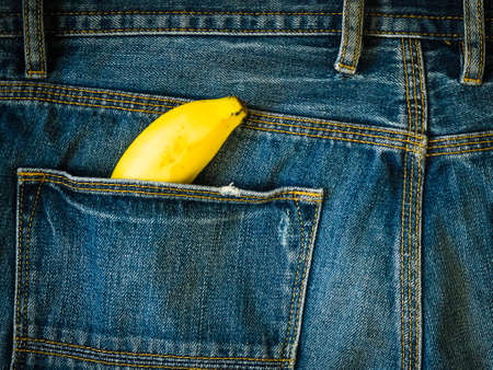 Fruit Eating Healthy lifestyle concept, Banana in bag of denim jeans textureの写真素材