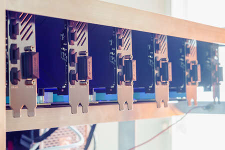 Cryptocurrency background (mining rig), Cryptocurrency mining rig using graphic cards to mine for digital cryptocurrency such as bitcoin, ethereum and other altcoins.の写真素材