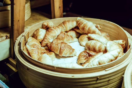Still life of fresh croissants in a basket