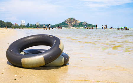 Thailand beach travle background concept - Life Ring on the beach, Life Ring on the sand at Huahin Thailandの写真素材