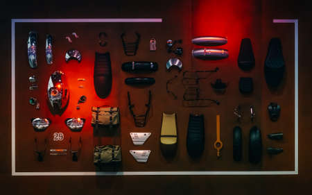 Display  of motorcycle Accessories and spare parts arrangement hanging on wooden wall for motorcycle fashion decorationの写真素材