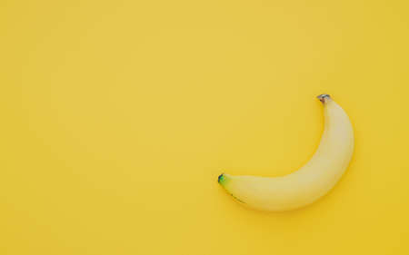 One ripe sweet testy banana on yellow background top view with copy spaceの写真素材