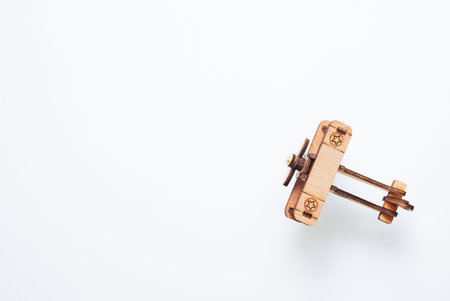 Wooden plane,airplane model on white background. Top view, Flat Lay style with copy space.