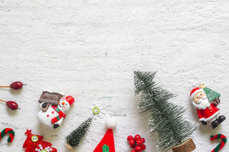 Christmas decoration toys and ornaments on rustic white wooden background. Flat lay Top view with copy space.の写真素材