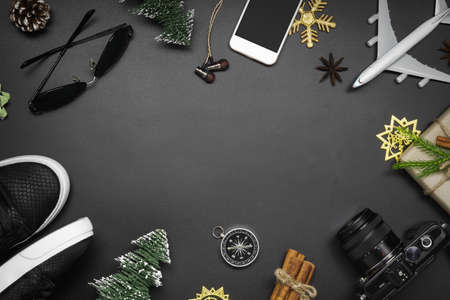 Merry Christmas and Happy new years travel concept background for winter trip on wood background , Travel with airplane top view with copy space.の写真素材