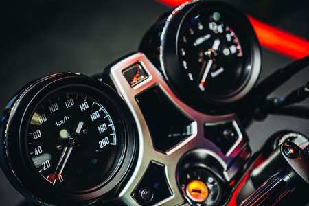 Close up detail shot of dashboard display of speedometer & analog gauge of modern sport motorcycle.の写真素材