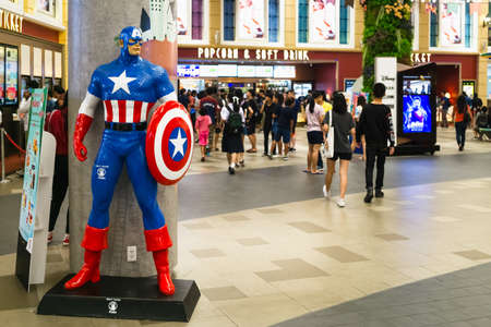 Bangkok, Thailand - Apr 24, 2019: Avengers 4 Endgame character model Captain America in front of the Theatre with People queing up to buy tickets at cinema to see the Avengers Endgame.のeditorial素材