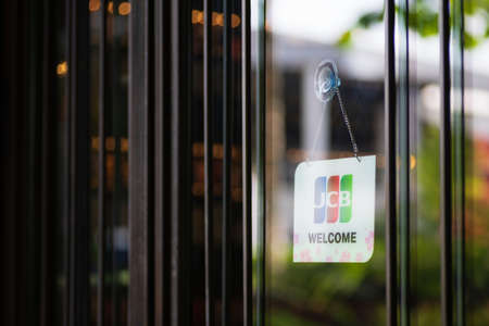 Bangkok, Thailand - May 26, 2019: JCB credit cards and welcome sign hangs in front of a shopping store in in Bangkok, Thailand. JCB is a credit card company based in Tokyo Japan.のeditorial素材
