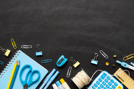 Back to School background concept. School supplies on a chalkboard background. Education background...