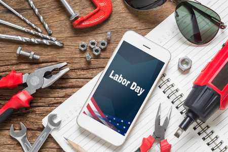 Table top view of decoration the sign of USA labor day background concept. Flat lay mock up Smart...