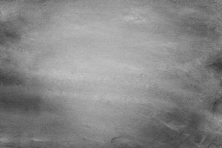 Old black background. Grunge texture. Black chalkboard background. Dark wallpaper. Blackboard. Chalk board.の写真素材