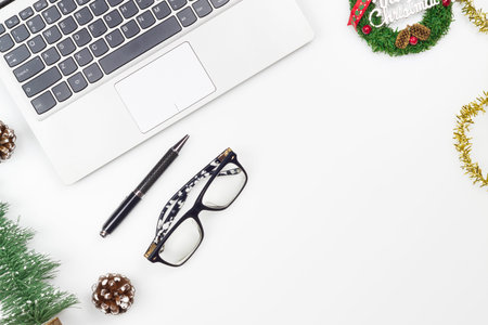 Merry Christmas and Happy new years office work space desktop concept. Flat lay top view with...