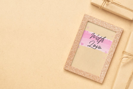 Mockup photo frame with kraft present boxes for Valentines day concept. Top view of mock up photo...