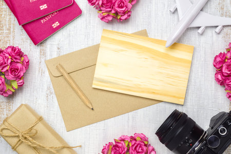 Mockup blank wooden card and envelop on grunge white wood for travel with valentines day & love...