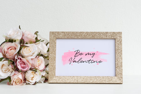 Mockup Picture frame and pink roses. Valentines Day Background concept with copy space. Mock up with photo frame and flowers with space for your picture or textの写真素材