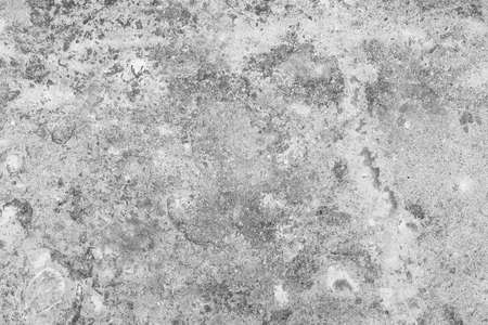 Grey abstract grunge background, Grunge black and white dirty backdrop. Monochrome old scartched texture from stains, cracks, lines, chips. Chaotic pattern texture for background, screen, overlay.の写真素材