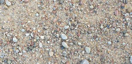Closeup of gravel road ground. With stonesの写真素材