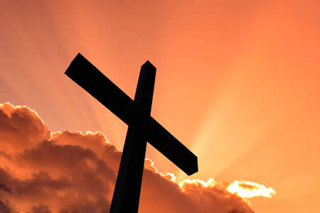 Cross silhouette and the holy skyの写真素材
