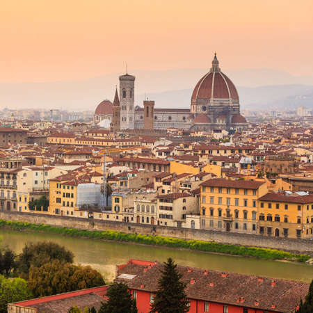 Florence city during sunset. Panoramic view to the river Arno, with Ponte Vecchio, Palazzo Vecchio and Cathedral of Santa Maria del Fiore (Duomo), Florence, Italyの写真素材