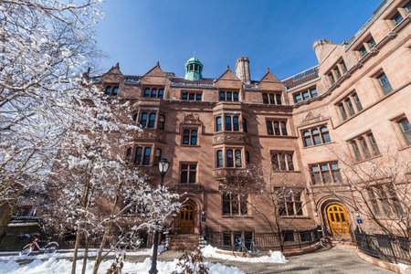 Yale university buildings in winter sunlight with snow and blue skyのeditorial素材