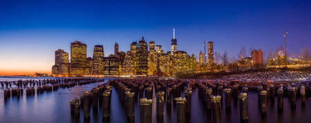 Manhattan Skyline with the One World Trade Center building at twilight, New York Cityの写真素材
