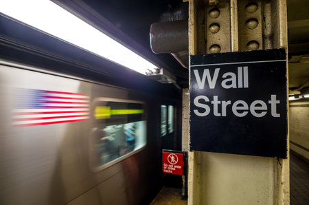 Wall street subway sign in New York City Manhattan station.